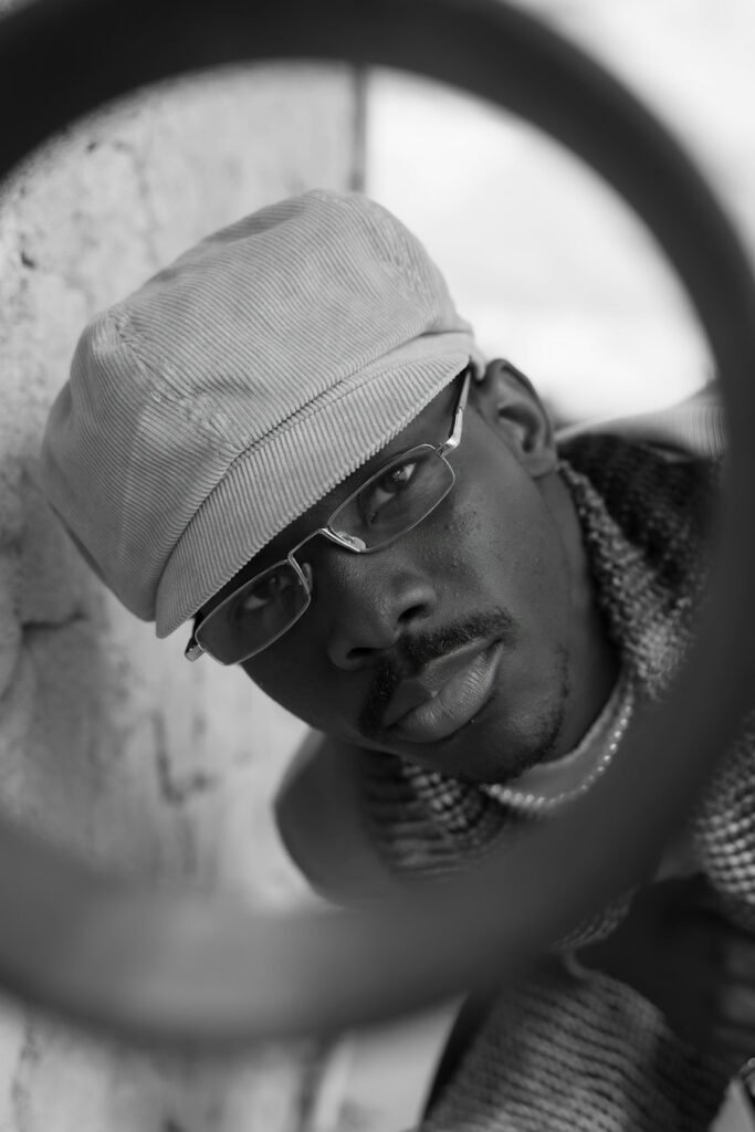 Fashion editorial featuring a neutral baseball cap